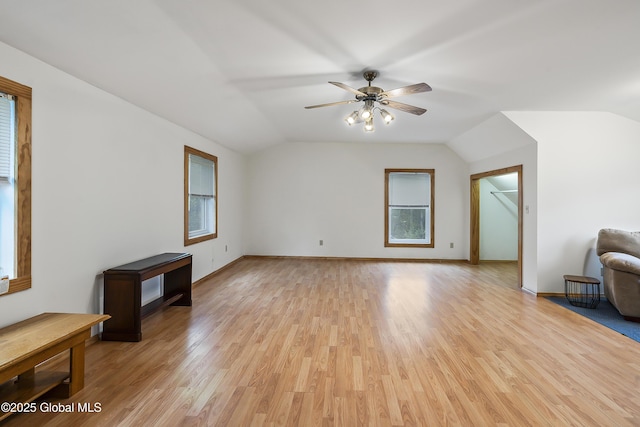 19 Karen St, Warrensburg, NY 12885 - bonus room featuring lofted ceiling, plenty of natural light, a ceiling fan, and light wood-type flooring