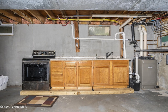 19 Karen St, Warrensburg, NY 12885 - basement with a sink and a heating unit