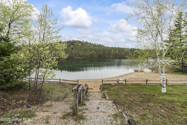 19 Karen St, Warrensburg, NY 12885 - water view featuring fence and a heavily wooded area