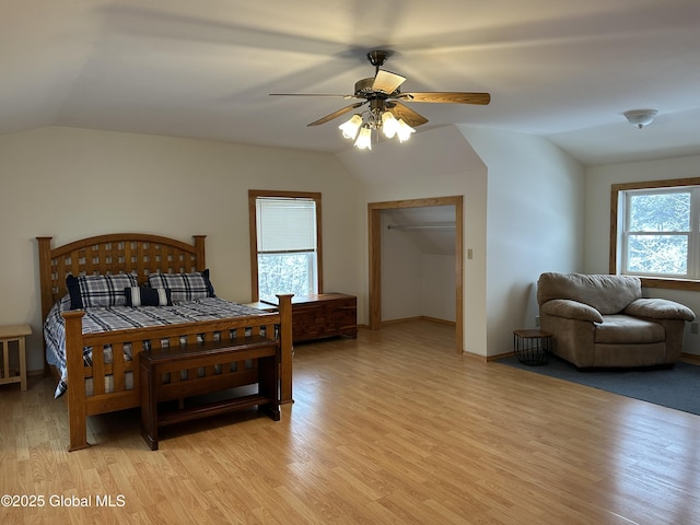 19 Karen St, Warrensburg, NY 12885 - bedroom featuring lofted ceiling, light wood-type flooring, a ceiling fan, and baseboards