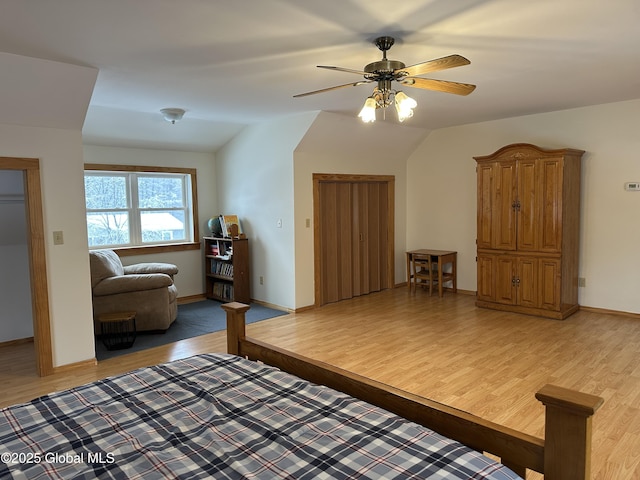 19 Karen St, Warrensburg, NY 12885 - bedroom featuring light wood-style flooring, baseboards, ceiling fan, and lofted ceiling