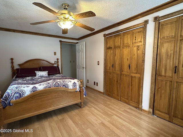 19 Karen St, Warrensburg, NY 12885 - bedroom featuring light wood finished floors, ornamental molding, a textured ceiling, ceiling fan, and baseboards