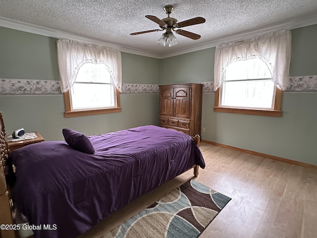 19 Karen St, Warrensburg, NY 12885 - bedroom featuring multiple windows, a textured ceiling, light wood-type flooring, crown molding, and ceiling fan
