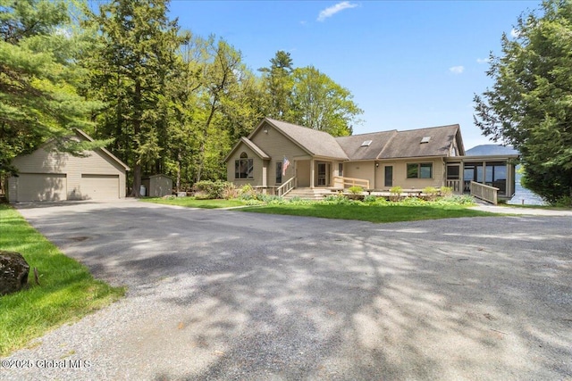 31 Fish Point Rd, Bolton, NY 12824 - ranch-style home with an outdoor structure and a garage