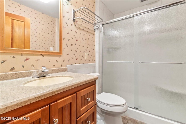 31 Fish Point Rd, Bolton, NY 12824 - bathroom with a stall shower, wallpapered walls, toilet, vanity, and tile patterned floors