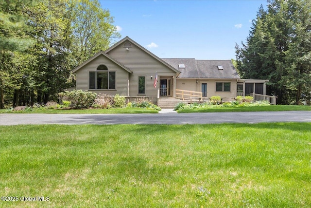 31 Fish Point Rd, Bolton, NY 12824 - single story home featuring a sunroom and a front yard
