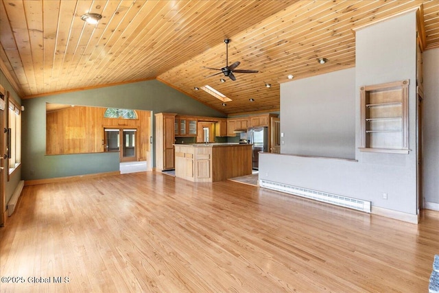 31 Fish Point Rd, Bolton, NY 12824 - unfurnished living room with a baseboard radiator, a ceiling fan, wooden ceiling, lofted ceiling, and light wood-style flooring