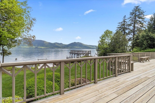 31 Fish Point Rd, Bolton, NY 12824 - wooden deck featuring a water and mountain view and a boat dock