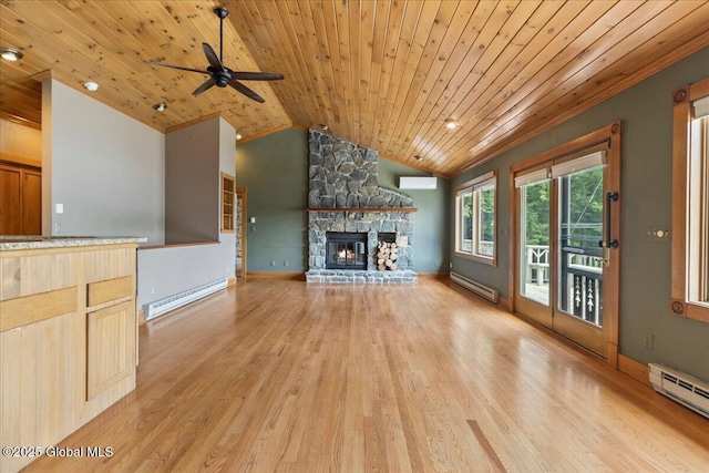 31 Fish Point Rd, Bolton, NY 12824 - unfurnished living room with baseboard heating, wooden ceiling, a stone fireplace, light wood-style flooring, and vaulted ceiling