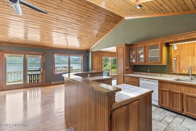 31 Fish Point Rd, Bolton, NY 12824 - kitchen featuring dishwasher, wooden ceiling, tile countertops, a sink, and baseboard heating