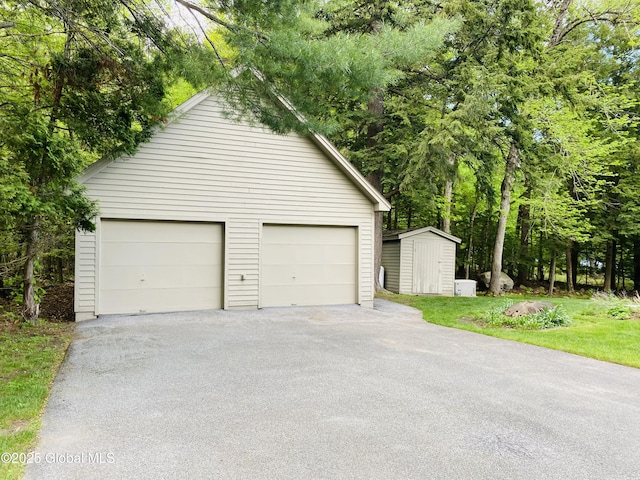 31 Fish Point Rd, Bolton, NY 12824 - detached garage with a storage unit