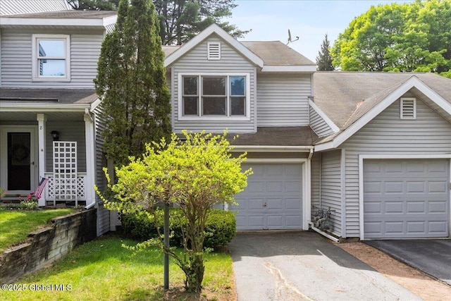 10 Tiffany Dr, Queensbury, NY 12804 - view of front of home featuring driveway and roof with shingles