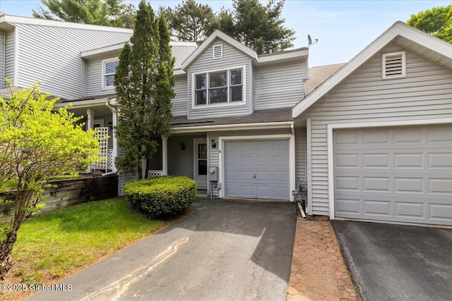 10 Tiffany Dr, Queensbury, NY 12804 - multi unit property with asphalt driveway and a garage