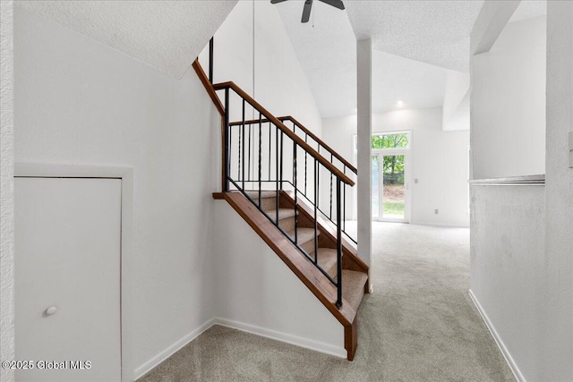 10 Tiffany Dr, Queensbury, NY 12804 - stairs with carpet, lofted ceiling, a textured ceiling, baseboards, and a ceiling fan