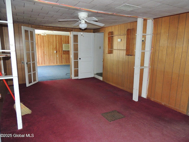30 Prospect St, Warrensburg, NY 12885 - basement with wooden walls, ceiling fan, french doors, carpet flooring, and baseboards