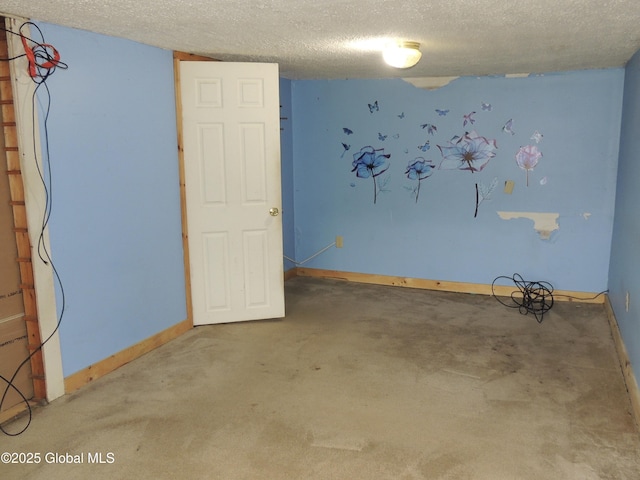 30 Prospect St, Warrensburg, NY 12885 - unfurnished room featuring a textured ceiling, baseboards, and carpet floors