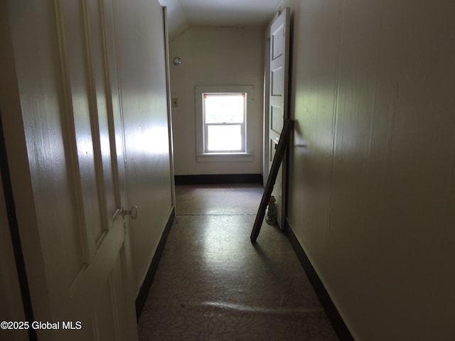 30 Prospect St, Warrensburg, NY 12885 - hallway featuring lofted ceiling and baseboards