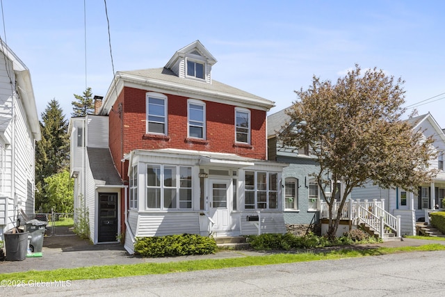 9 Archibald St, Colonie, NY 12189 - traditional style home featuring entry steps and brick siding