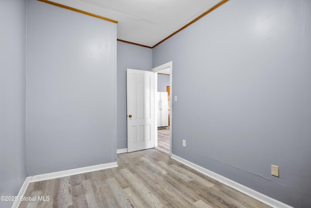 9 Archibald St, Colonie, NY 12189 - unfurnished room featuring crown molding, wood finished floors, and baseboards