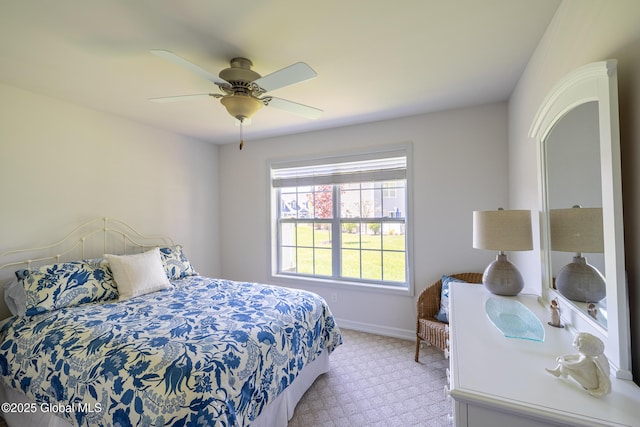 bedroom featuring carpet floors, ceiling fan, and baseboards