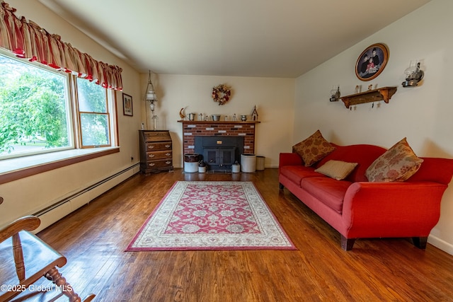 76 Mcnutt Ave, Colonie, NY 12205 - living room with baseboard heating and wood finished floors