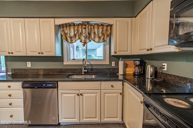 76 Mcnutt Ave, Colonie, NY 12205 - kitchen with black appliances, a sink, healthy amount of natural light, and white cabinetry