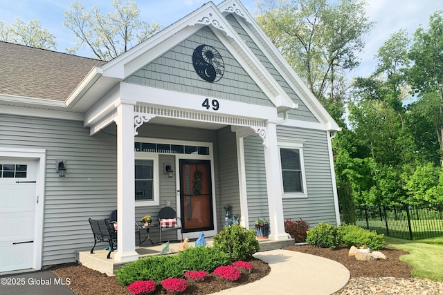 49 N Village Cir, Round Lake, NY 12151 - entrance to property with a porch and roof with shingles