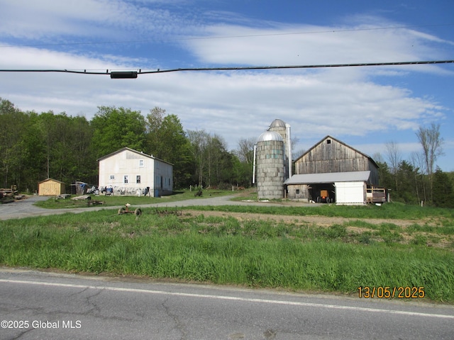 640 County Route 10, Whitehall, NY 12887 - view of yard featuring an outbuilding, a detached garage, and a barn