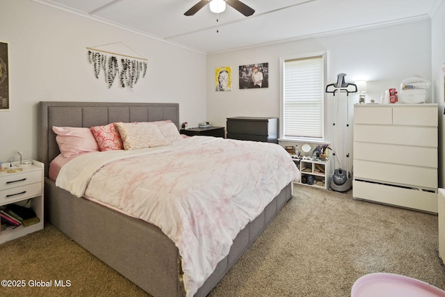 bedroom with a baseboard heating unit, carpet flooring, ornamental molding, and a ceiling fan