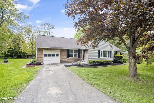 ranch-style home featuring asphalt driveway, an attached garage, stone siding, a front lawn, and roof with shingles
