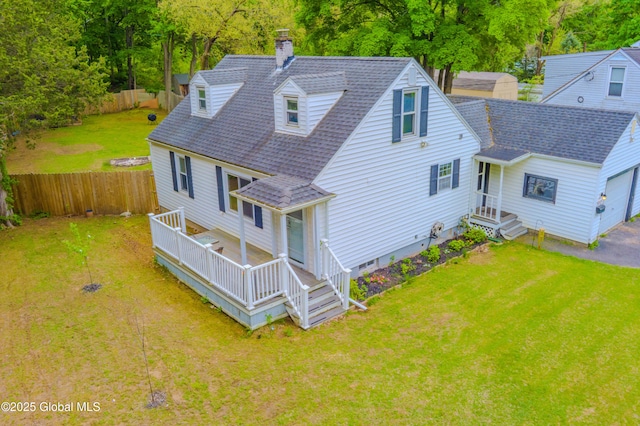 3001 Evelyn Dr, Guilderland, NY 12303 - rear view of property with a chimney, a shingled roof, a garage, and a deck