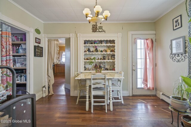 1506 5th Ave, Watervliet, NY 12189 - dining space featuring a chandelier, wood-type flooring, a baseboard heating unit, ornamental molding, and baseboards