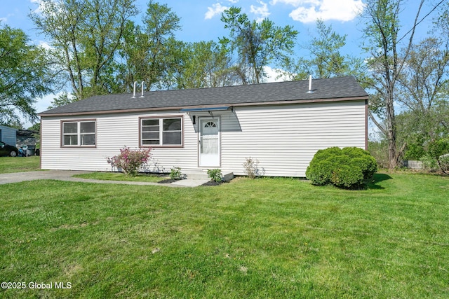 12 Jones Dr, Colonie, NY 12309 - view of front of house featuring a front lawn and roof with shingles
