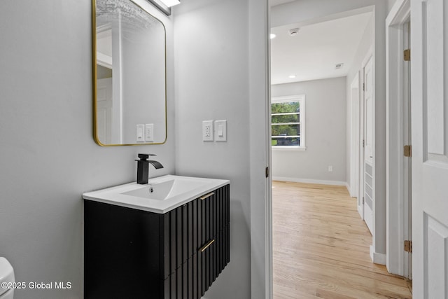12 Jones Dr, Colonie, NY 12309 - bathroom featuring vanity and wood finished floors