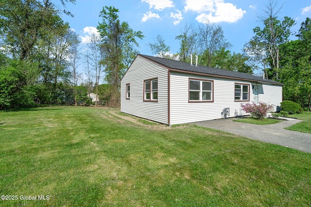 12 Jones Dr, Colonie, NY 12309 - view of front of house featuring a front yard and driveway