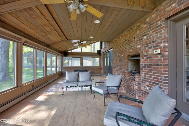 sunroom / solarium featuring a ceiling fan, a baseboard heating unit, and an outdoor living space
