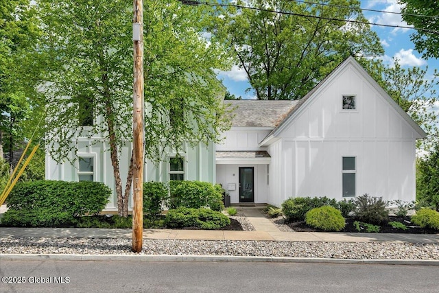 18 Granite St, Saratoga Springs, NY 12866 - view of front facade with board and batten siding and roof with shingles