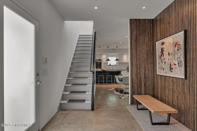 18 Granite St, Saratoga Springs, NY 12866 - corridor featuring finished concrete floors, stairs, and recessed lighting