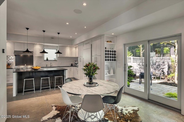18 Granite St, Saratoga Springs, NY 12866 - dining area featuring finished concrete flooring and recessed lighting