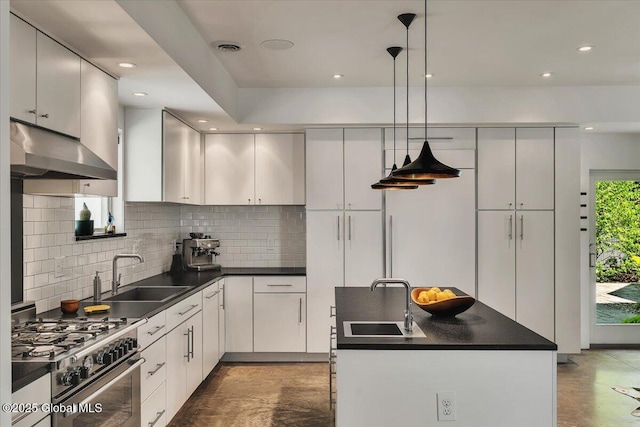 18 Granite St, Saratoga Springs, NY 12866 - kitchen featuring a sink, stainless steel gas range, ventilation hood, dark countertops, and recessed lighting