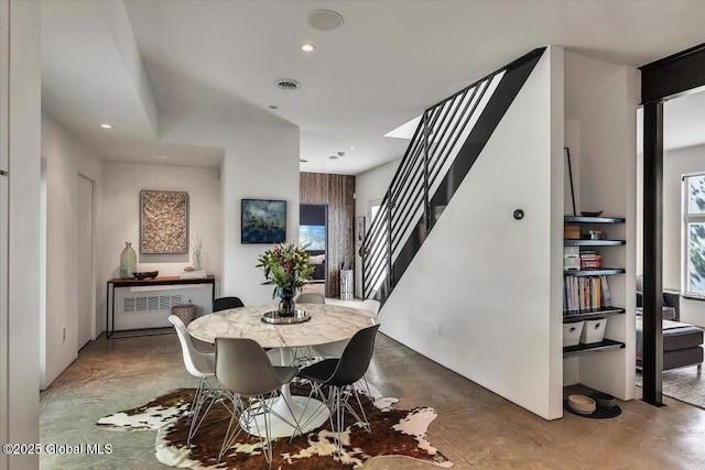 18 Granite St, Saratoga Springs, NY 12866 - dining area featuring concrete flooring, stairway, and recessed lighting