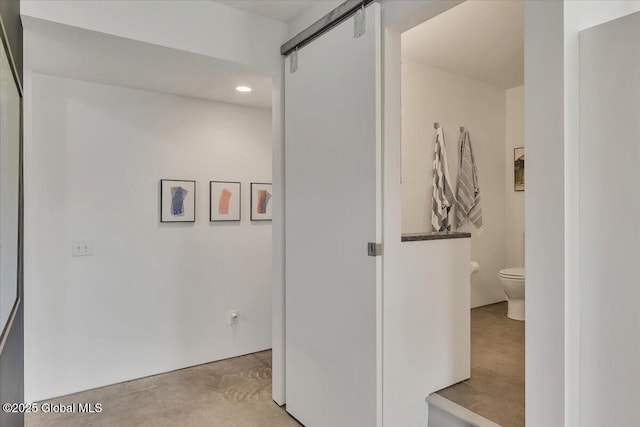 18 Granite St, Saratoga Springs, NY 12866 - corridor featuring a barn door and recessed lighting