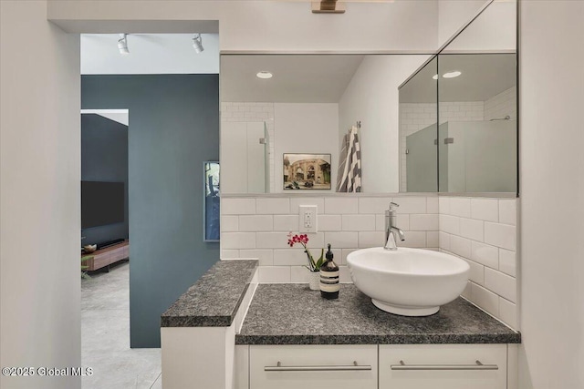 18 Granite St, Saratoga Springs, NY 12866 - full bath with vanity, backsplash, a shower with shower door, and recessed lighting