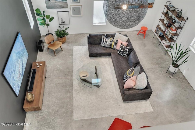 18 Granite St, Saratoga Springs, NY 12866 - living area featuring concrete floors