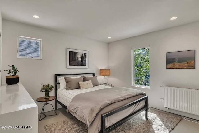 18 Granite St, Saratoga Springs, NY 12866 - bedroom with radiator heating unit, recessed lighting, and light tile patterned floors