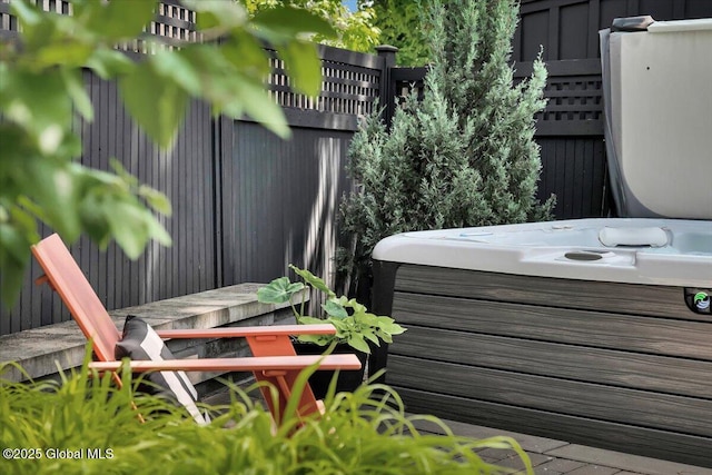 18 Granite St, Saratoga Springs, NY 12866 - view of patio / terrace with a hot tub
