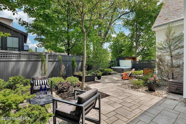 18 Granite St, Saratoga Springs, NY 12866 - fenced backyard with a patio and a hot tub
