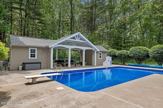 9 Meghan Ct, Wilton, NY 12866 - view of pool featuring a storage structure, an outbuilding, an outdoor living space, a patio area, and a diving board