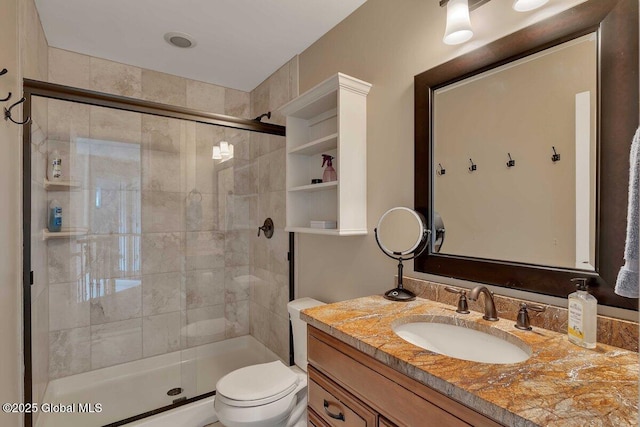 9 Meghan Ct, Wilton, NY 12866 - full bath with a stall shower, vanity, and toilet