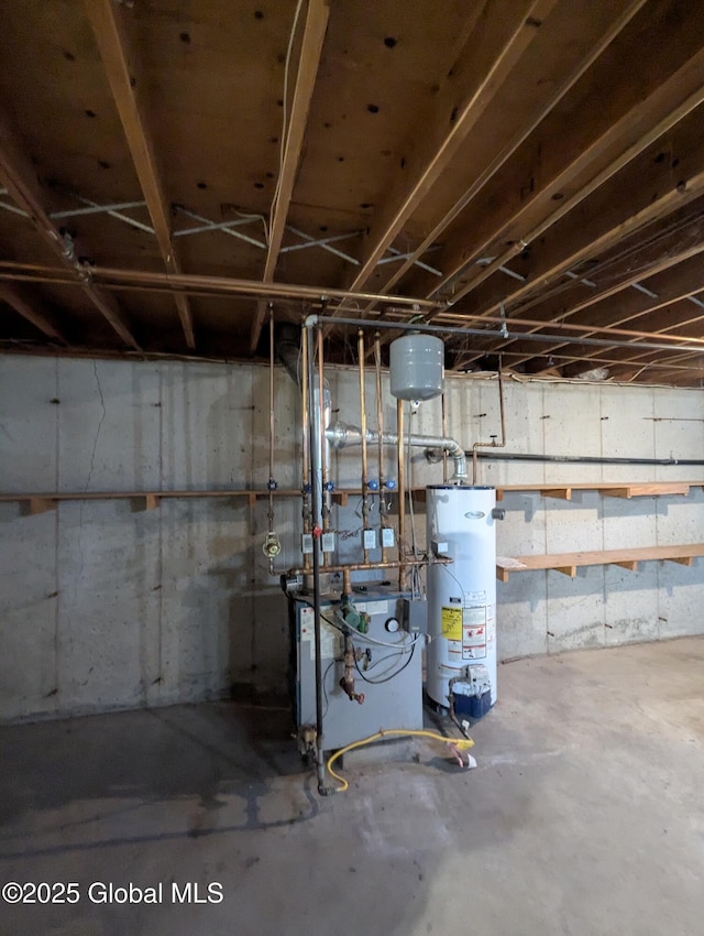 14 W Main St, Fort Plain, NY 13339 - unfinished basement with water heater and a heating unit